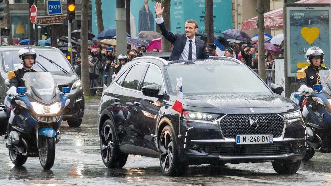 Emmanuel Macron, President of France, using a plug-in hybrid (PHEV) DS7 SUV.
