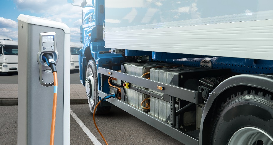 Electric truck with charging station